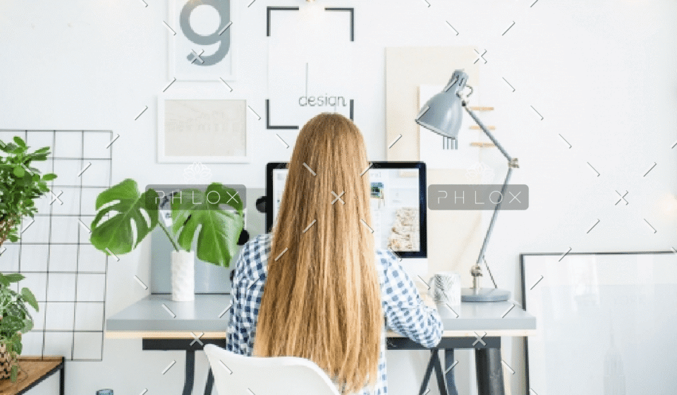 demo-attachment-928-happy-lady-sitting-in-office-coworking-while-P5AFND8